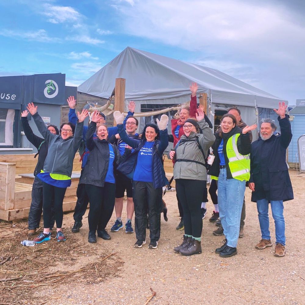 Group of people cheering taking part in the Dorset Mind Big Walk